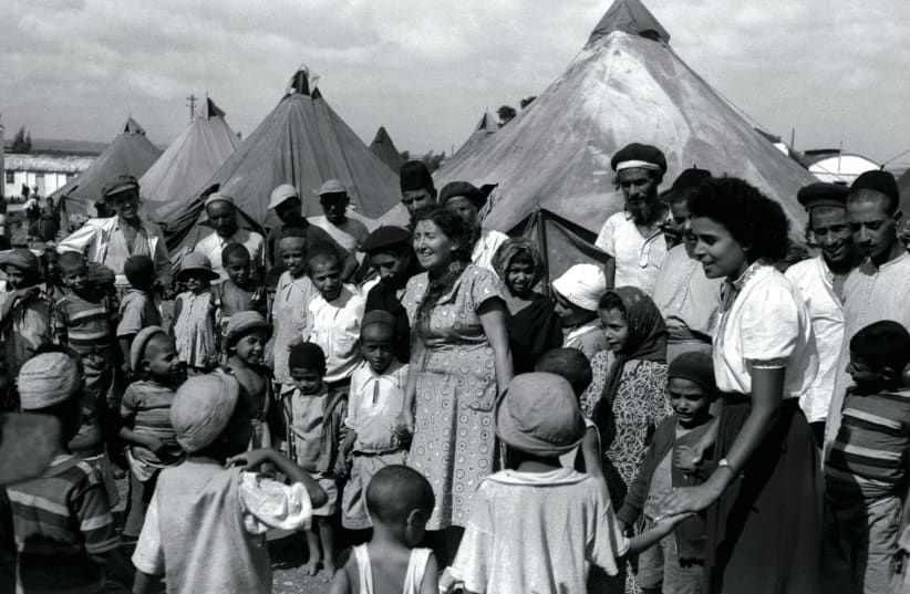 JEWISH OLIM from Yemen near a tent in 1949 (photo credit: REUTERS)