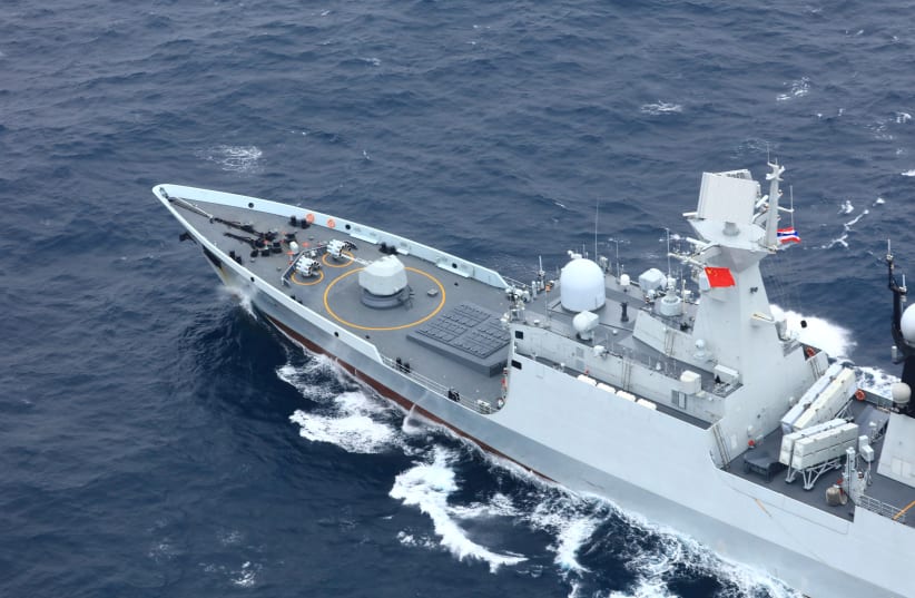 Chinese People's Liberation Army (PLA) Navy’s guided-missile frigate Yueyang takes part in a China-Thailand joint naval exercise in waters off the southern port city of Shanwei, Guangdong province, China May 6, 2019. (photo credit: REUTERS)