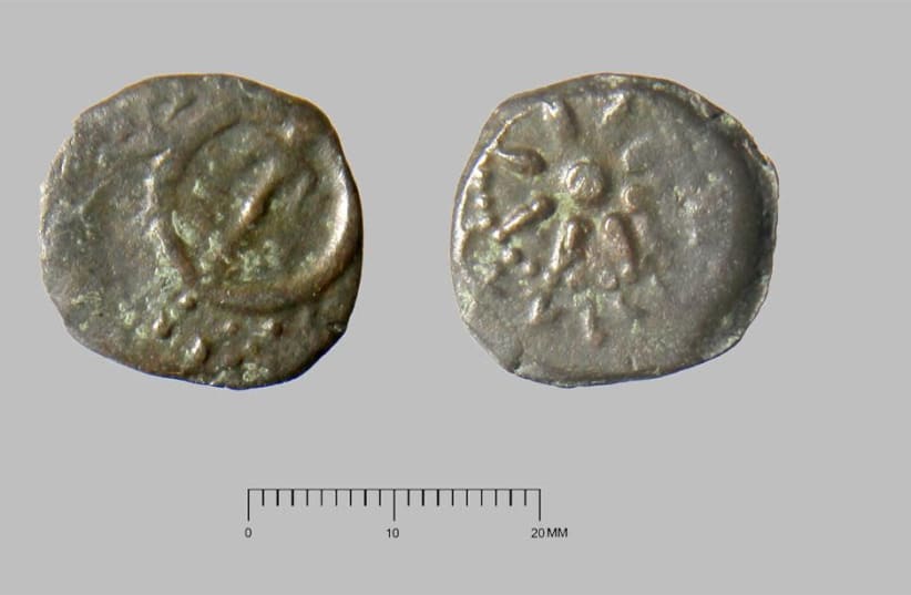 An example of an ancient Hasmonean coin found in Shiloh that dates back to Alexander Jannnaeus and his successors. (photo credit: MICHAEL LUDDENI)