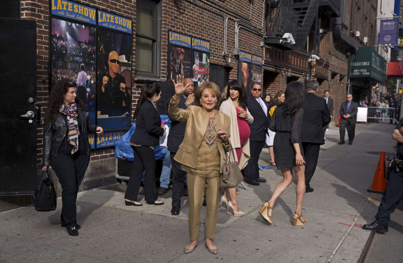 Journalist Barbara Walters departs Ed Sullivan Theater in Manhattan after taking part in the taping of tonight's final edition of "The Late Show with David Letterman" in New York (photo credit: REUTERS)