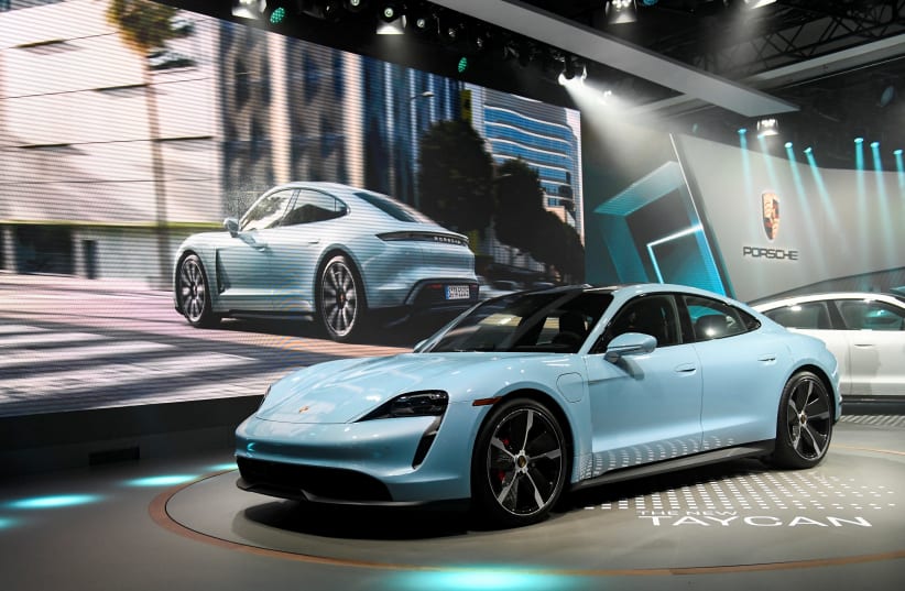 Porsche introduces its new Taycan 4S at the LA Auto Show in Los Angeles, California, U.S., November 20, 2019 (photo credit: REUTERS)