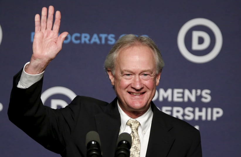 Democratic presidential candidate Lincoln Chafee waves good bye after dropping out of the presidential race, at the Democratic National Committee's Women's Leadership Forum's 22nd annual conference in Washington October 23, 2015. Former Rhode Island Governor Chafee said on Friday he is dropping out  (photo credit: REUTERS/GARY CAMERON)