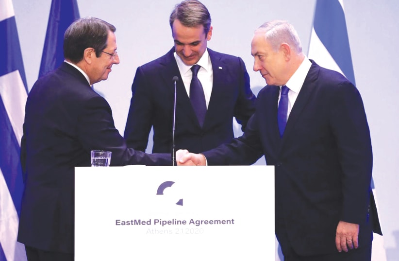 FROM LEFT, Cypriot President Nicos Anastasiades, Greek Prime Minister Kyriakos Mitsotakis and Prime Minister Benjamin Netanyahu attend last week’s signing in Athens. (photo credit: REUTERS)