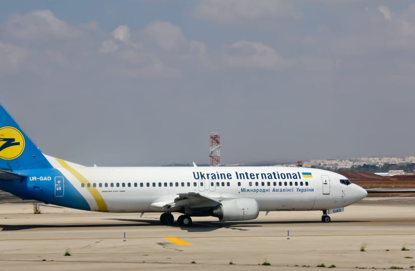 A Ukraine International Airlines Boeing 737-400 at Ben Gurion Airport, illustrative (photo credit: RAIMOND SPEKKING/WIKIMEDIA COMMONS)