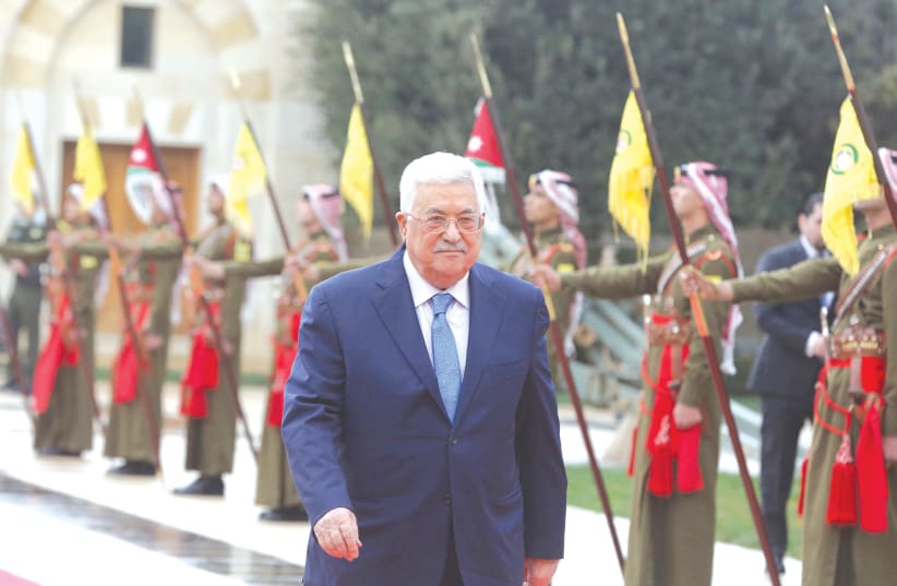 Palestinian President Mahmoud Abbas arrives to meet with Jordan's King Abdullah in Amman, last year. (photo credit: KHALIL MARZAAWI/REUTERS)