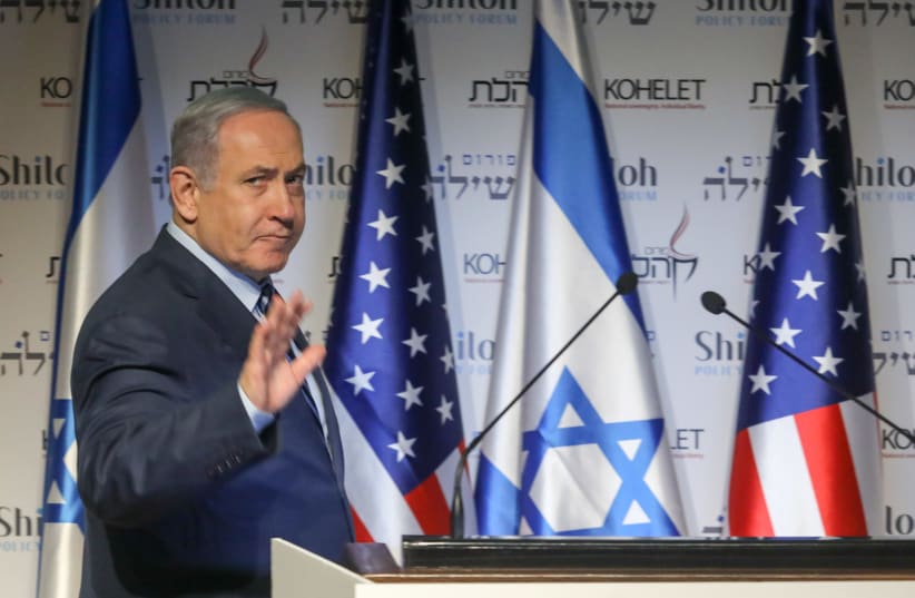 PRIME MINISTER Benjamin Netanyahu speaks during a conference in Jerusalem Wednesday. Will the US action in Iraq help his campaign? (photo credit: REUTERS/Ronen Zvulun)