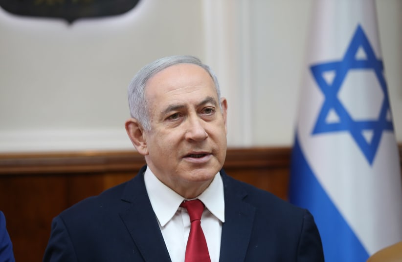 Prime Minister Benjamin Netanyahu attends the weekly cabinet meeting, January 2020. (photo credit: ALEX KOLOMOISKY / POOL)