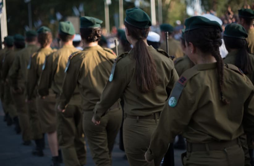 Female IDF intelligence officers march in a ceremony (photo credit: IDF SPOKESPERSON'S UNIT)