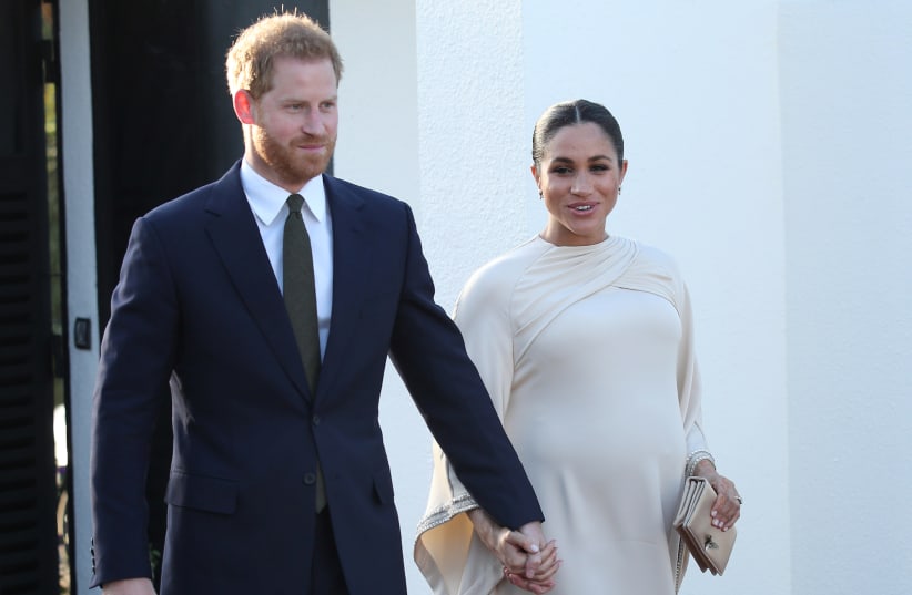 Britain's Prince Harry and Meghan, Duchess of Sussex arrive for a reception hosted by the British Ambassador to Morocco at the British Embassy in Rabat, Morocco February 24, 2019. (photo credit: YUI MOK/POOL VIA REUTERS)