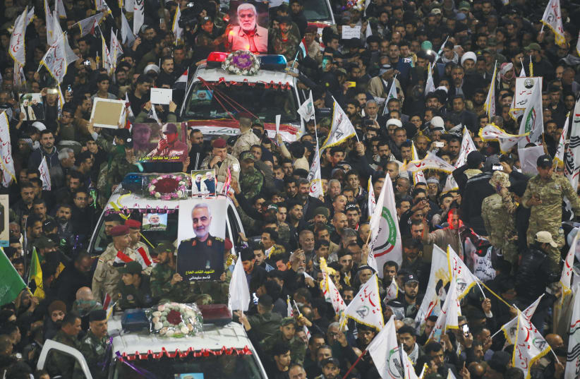 Mourners attend the funeral of Qasem Soleimani (pictured) in Kerbala, Iraq,  on January 4 (photo credit: REUTERS)