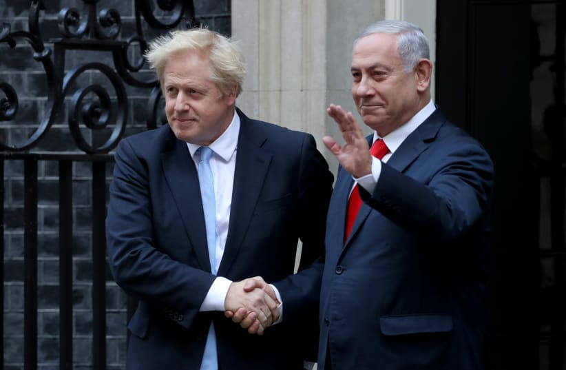 Britain's Prime Minister Boris Johnson welcomes Israel's Prime Minister Benjamin Netanyahu outside Downing Street in London, Britain September 5, 2019. (photo credit: SIMON DAWSON/ REUTERS)