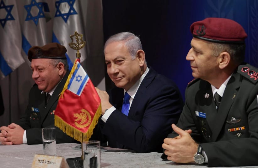 KOCHAVI (RIGHT) and predecessor Lt.-Gen. (ret.) Gadi Eisenkot flank Prime Minister Benjamin Netanyahu at the chief of staff switchover ceremony. (Amos Ben Gershom (photo credit: IDF)