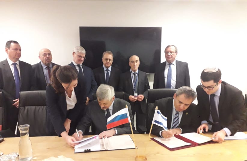 Israel and Russia signed an adoption agreement on January 22, 2020. (photo credit: JERUSALEM AFFAIRS MINISTER ZEEV ELKIN'S OFFICE)