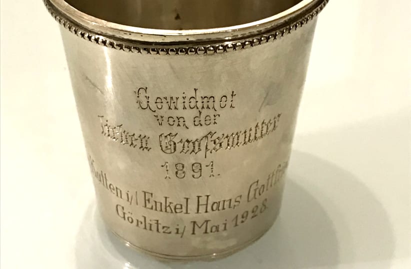 THE SILVER Kiddush cup given to the writer’s late husband John on his birth by his grandmother Nanny Katten, who perished in Therezenstadt. The cup has been passed down to the couple’s son Adam. (photo credit: Courtesy)