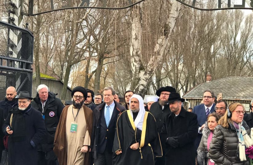 Muhammad bin Abdul Karim Issa of the Muslim World League visits Auschwitz with David Harris, Rabbi David Rosen, and  Harriet Schleifer of the American Jewish Committee. January 23, 2020.  (photo credit: Courtesy)