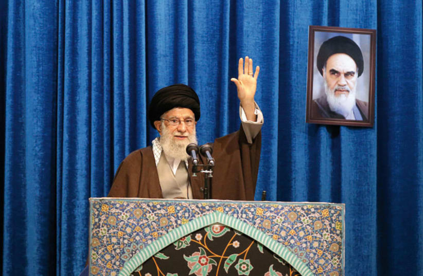 Iran’s Supreme Leader Ayatollah Ali Khamenei gestures as he delivers a Friday prayer sermon in Tehran on January 17 (photo credit: REUTERS)