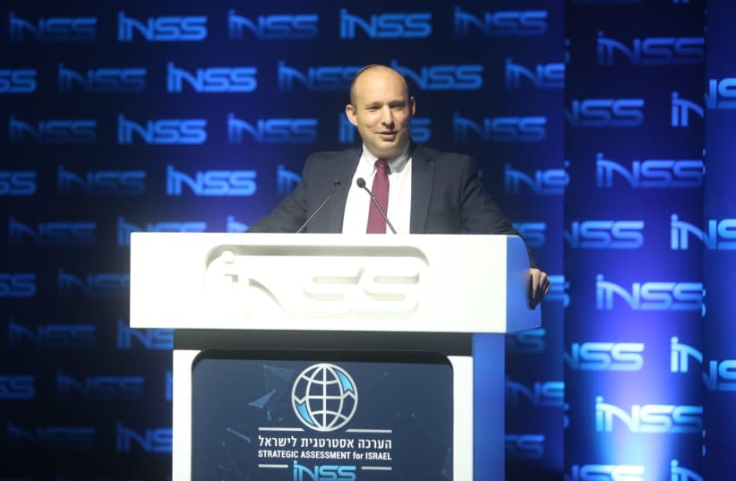 Defense Minister Naftali Bennett speaks at the INSS conference. (photo credit: CHEN GALILI)