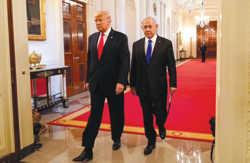 US PRESIDENT Donald Trump and Prime Minister Benjamin Netanyahu arrive to deliver joint remarks on a Middle East peace plan proposal at the White House Wednesday.  (photo credit: JOSHUA ROBERTS / REUTERS)