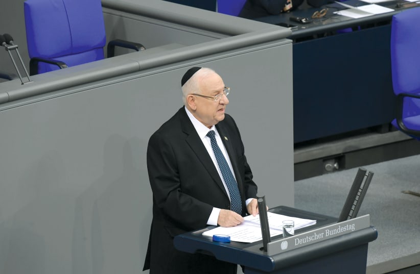 PRESIDENT REUVEN RIVLIN wears a black kippah at the Bundestag. (photo credit: AMOS BEN-GERSHOM/GPO)