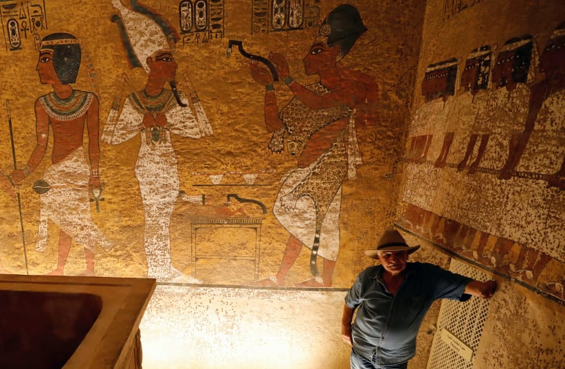 Former Tourism Minister Zahi Hawass, explaining paintings on the newly renovated tomb wall of boy pharaoh King Tutankhamun in the Valley of the Kings in Luxor (photo credit: REUTERS)