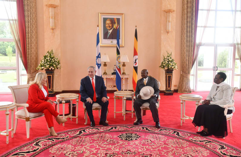 Prime Minister Benjamin Netanyahu and wife, Sarah, meet with Uganda's President Yoweri Kaguta Museveni., February 3, 2020 (photo credit: HAIM ZACH/GPO)