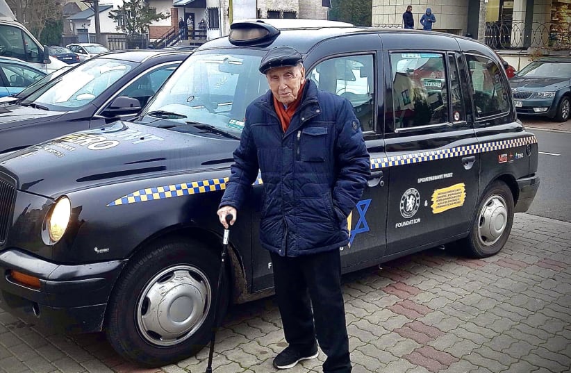 100 year old Righteous Among The Nations Jozef Walaszczyk standing In front of the taxi (photo credit: FROM THE DEPTHS)