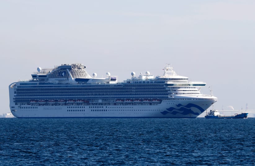 Cruise ship Diamond Princess is seen anchored off the Yokohama Port, after ten people on the cruise liner have tested positive for coronavirus in Yokohama (photo credit: REUTERS)