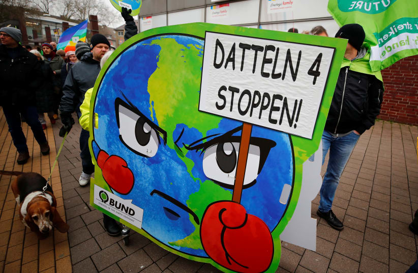 Greenpeace, Fridays for Future and other environmental organisations protest against the commissioning of the North Rhine Westphalian stone coal-fired power plant Datteln 4 in Datteln, Germany, January 24, 2020 (photo credit: REUTERS/WOLFGANG RATTAY)