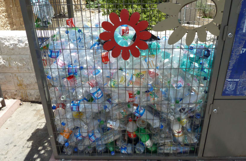 A PLASTIC bottle recycling cage in the Musrara neighborhood. (photo credit: Wikimedia Commons)