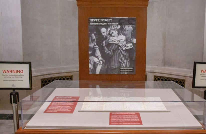 An exhibit at the National Archives marks the 75th anniversary of the liberation of Auschwitz, in a photo taken Feb. 5, 2020 (photo credit: NATIONAL ARCHIVES PHOTO BY SUSANA RAAB VIA JTA)