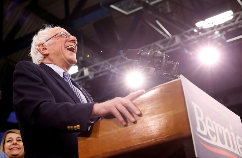 Democratic US presidential candidate Senator Bernie Sanders speaks at his New Hampshire primary night rally in Manchester, NH, US (photo credit: REUTERS)