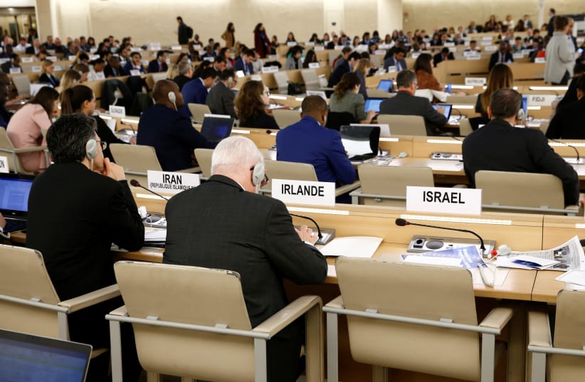 The empty seat of Israel is pictured during a session of the Human Rights Council at the United Nations in Geneva, 2019 (photo credit: DENIS BALIBOUSE/REUTERS)