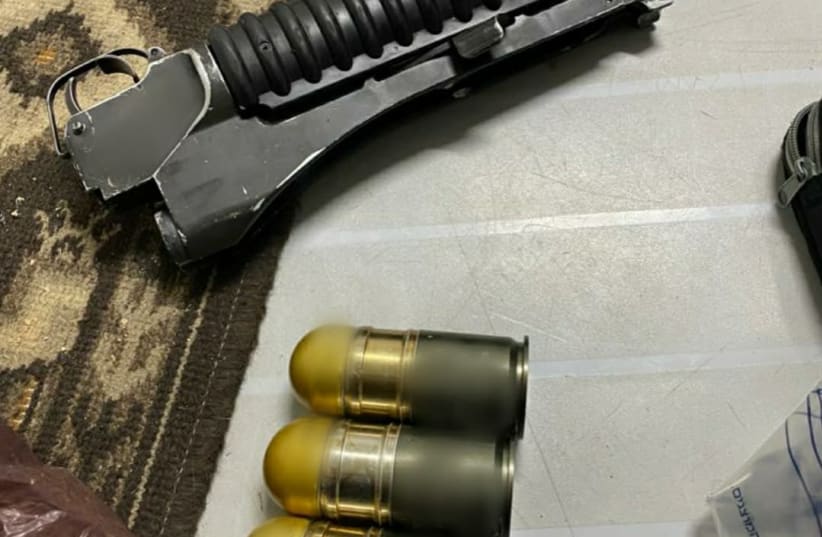 M-16 and grenades found during operations by Israeli police (photo credit: COURTESY ISRAEL POLICE)