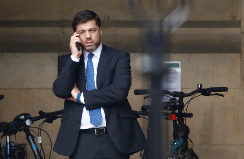 British Conservative MP Stephen Crabb is seen near the Houses of Parliament in London, Britain (photo credit: REUTERS/HENRY NICHOLLS)