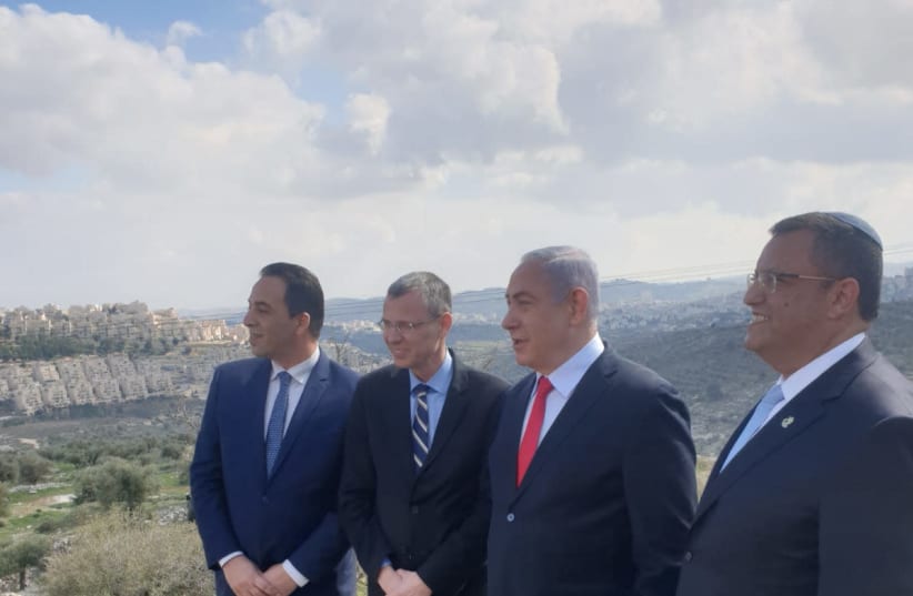 PM Benjamin Netanyahu and Jerusalem Mayor Moshe Lion announce new housing units in Har Homa (photo credit: AMOS BEN-GERSHOM/GPO)