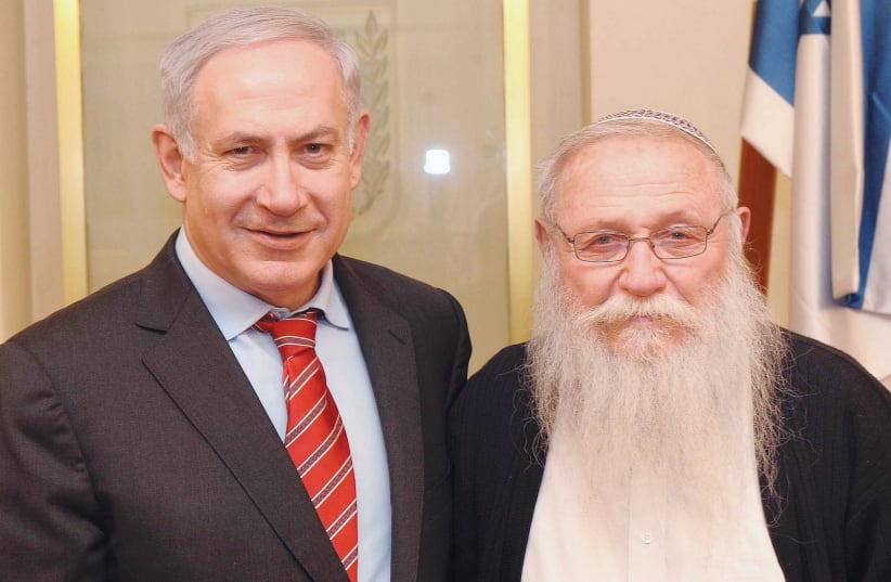 PRIME MINISTER Benjamin Netanyahu with Rabbi Haim Druckman in 2012. (photo credit: AVI OHAYON/GPO/FLASH90)