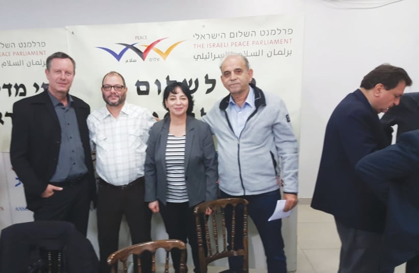 DR. WARDA SADA WITH fellow participants, former MK Ophir Paz-Pines (left), the Joint List’s Ofer Cassif and former MK Ran Cohen (right). (photo credit: Courtesy)