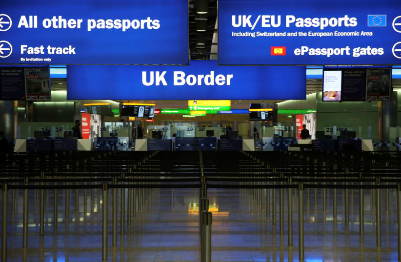 FILE PHOTO: UK Border control is seen in Terminal 2 at Heathrow Airport in London (photo credit: REUTERS)