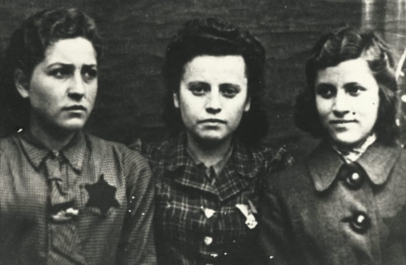 A photo of three Polish young women wearing yellow stars (photo credit: UNITED STATES HOLOCAUST MEMORIAL MUSEUM/GIFT OF MARK GRINBERG VIA JTA)