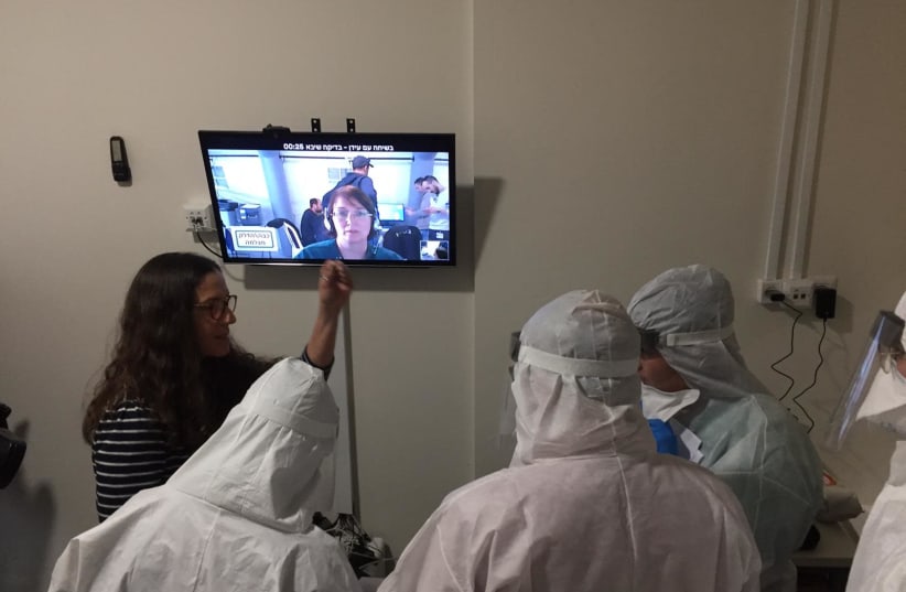 Head of Sheba Medical Center's telemedicine program Dr. Galia Barkai and others using Uniper Care technology. (photo credit: SHEBA MEDICAL CENTER)