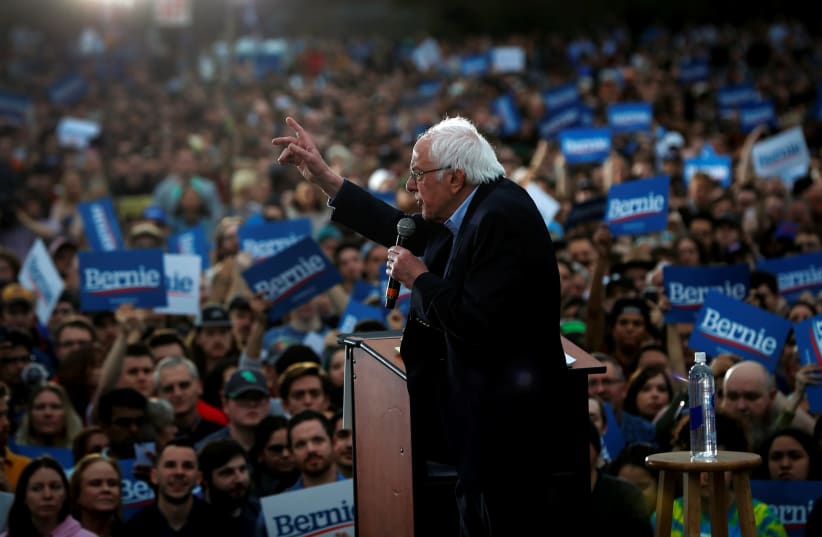 Democratic U.S. presidential candidate Senator Bernie Sanders speaks an outdoor campaign rally in Austin, Texas, U.S., February 23, 2020. (photo credit: REUTERS/MIKE SEGAR)