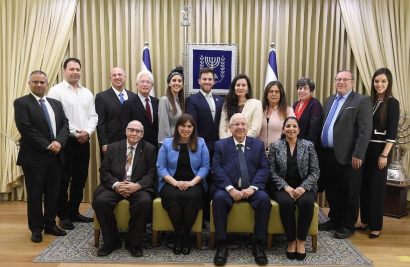Seated, from left to right, are Prof. Elyakim Rubinstein, Diaspora Affairs Minister  Tzipi Hotovely, President Reuven Rivlin and Shira Ruderman in front of other guest speakers at the forum on February 19 (photo credit: GPO)