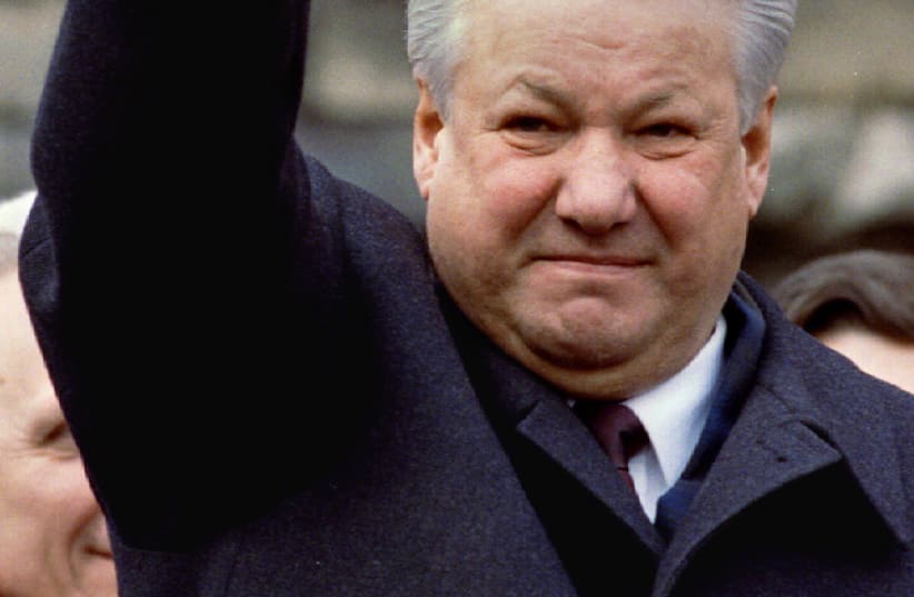 Boris Yeltsin gestures as he addresses a crowd in Moscow on March 28, 1993. Yeltsin died in 2007 at the age of 76. (photo credit: REUTERS)