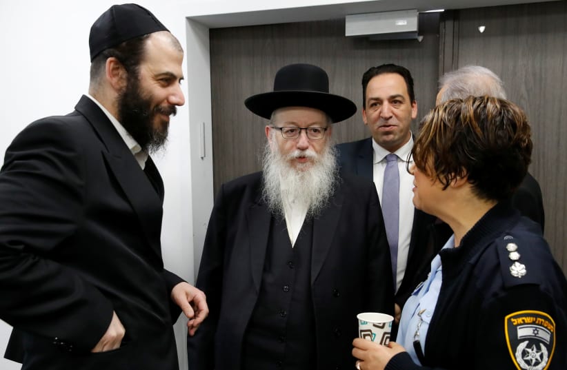 Israeli Health Minister Yaakov Litzman arrives for a situation assessment meeting regarding the novel coronavirus, at the Health Ministry in Tel Aviv, Israel February 23, 2020 (photo credit: REUTERS/JACK GUEZ)