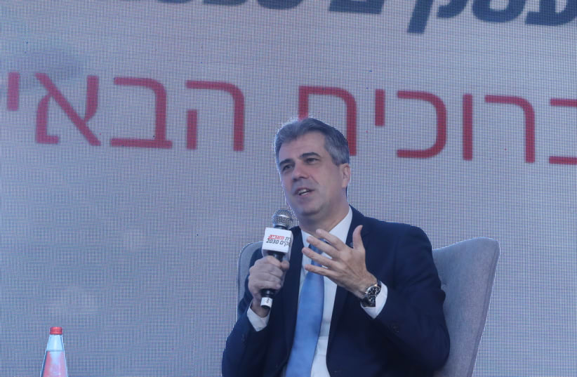 Economy Minister Eli Cohen speaks at the Maariv Business Conference Herzliya, February 26, 2020 (photo credit: MARC ISRAEL SELLEM)