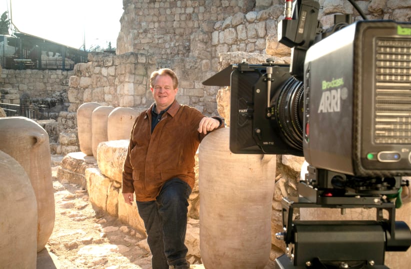 CBN CEO Gordon Robertson on the Ophel in Jerusalem’s Davidson Center. Archeologist Eilat Mazar believes this area to be a bakery in the royal palace of King Solomon. The large jars were used to store flour, oil and date honey for the royal bakery. (photo credit: ERIN ZIMMERMAN)