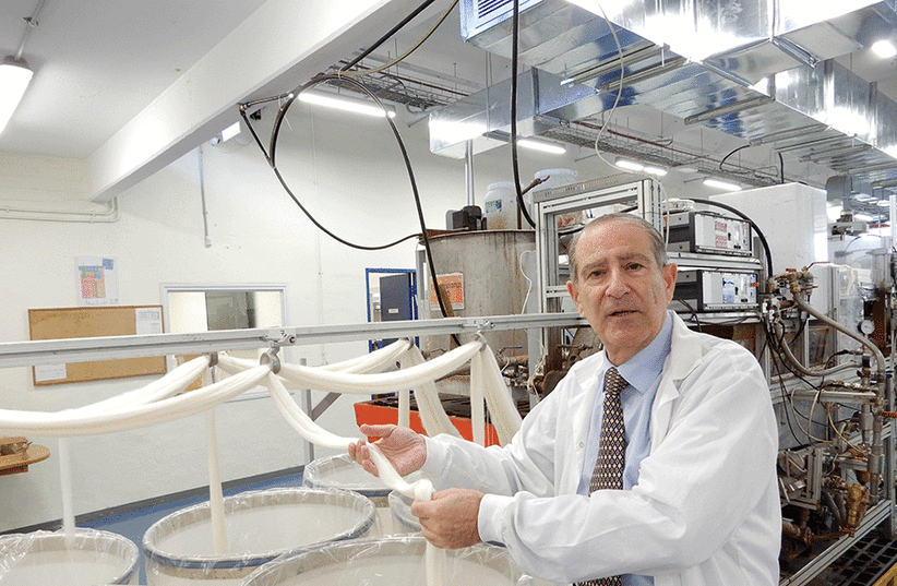Inventor Jeffrey Gabbay with copper-infused cotton fibers. -  (photo credit: FELICE FRIEDSON/TML PHOTOS)