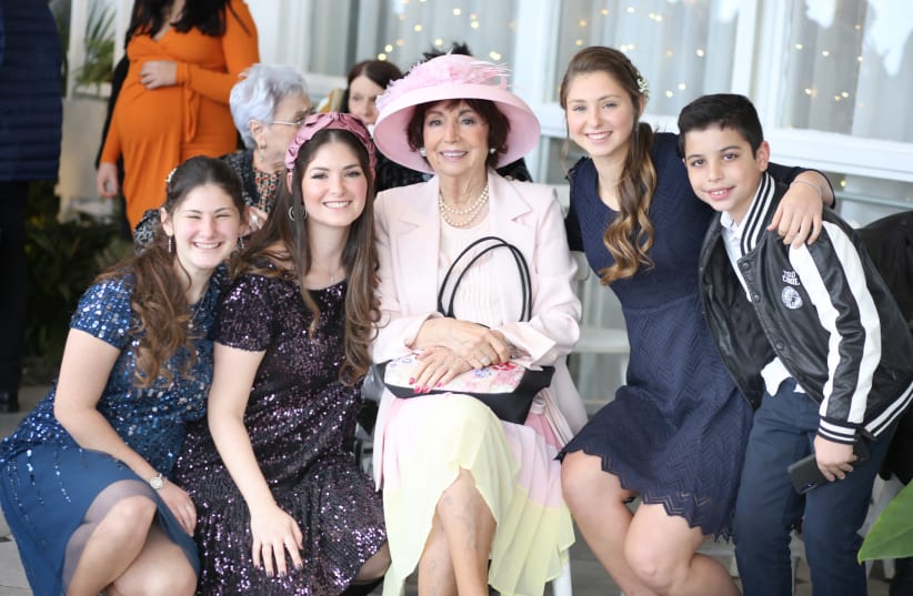 BARBARA OBERMAN with three granddaughters and a great-grandson at a recent family wedding (photo credit: KFIR HARBI)