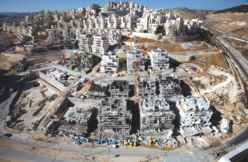 HOUSES UNDER construction in Har Homa. (photo credit: REUTERS)