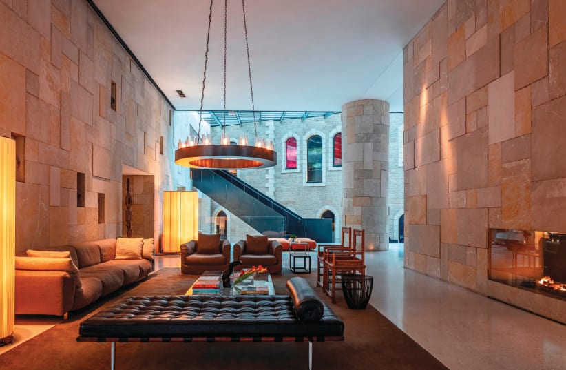 The lobby of the Mamilla Hotel reflects the colors and textures of Jerusalem's Old City. (photo credit: AMIT GARON)